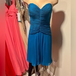 Strapless dress with ruffled top. Size 10. Color:Peacock